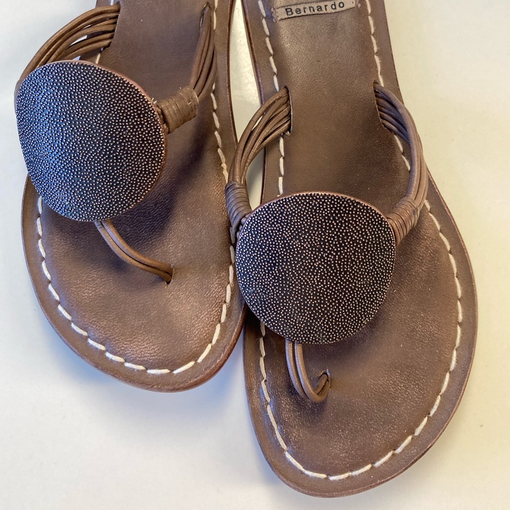 Bernardo Must brown flip flop sandals with bronze trim